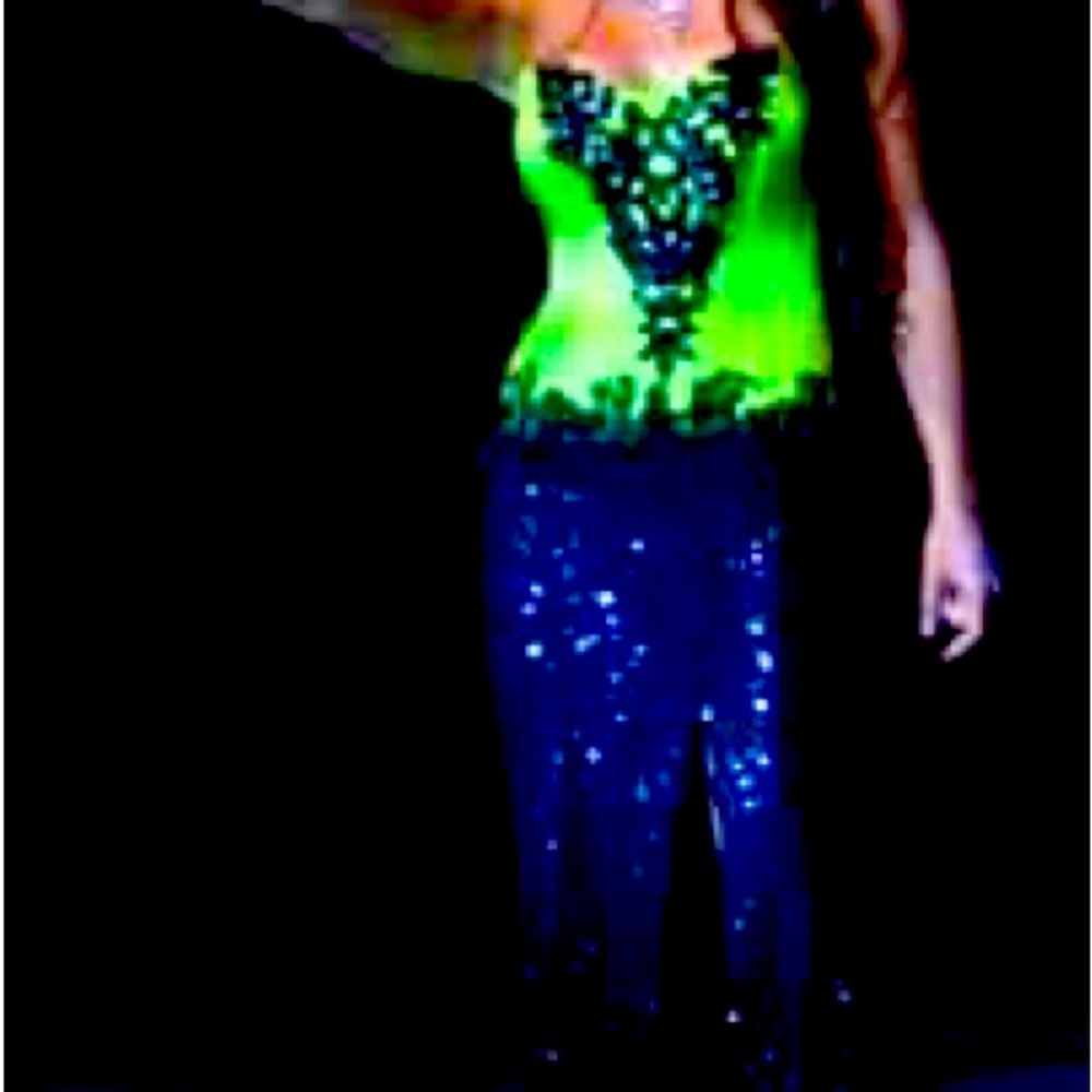 This dress is just right for the season.  Beautiful satin and sequins dress.